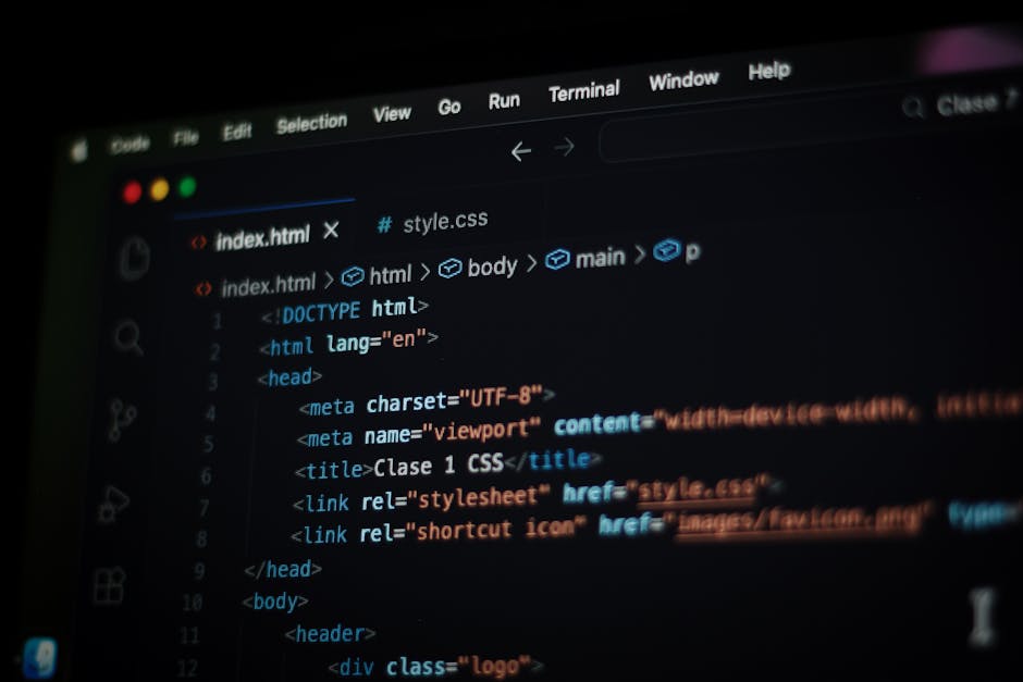 A close-up photograph of a computer screen displaying lines of colorful programming code, including keywords, variables, functions, and syntax in various shades such as red, green, blue, yellow, and w